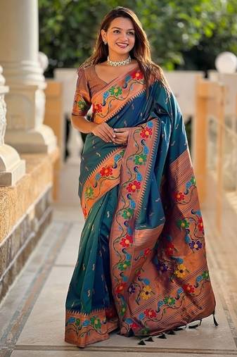 Teal silk blend saree with peacock motif zari border