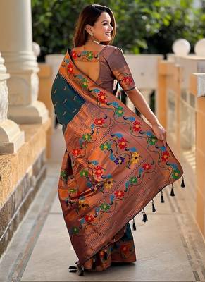 Teal silk blend saree with peacock motif zari border 2