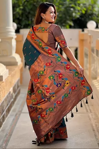 Teal silk blend saree with peacock motif zari border