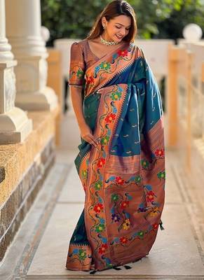 Teal silk blend saree with peacock motif zari border 3