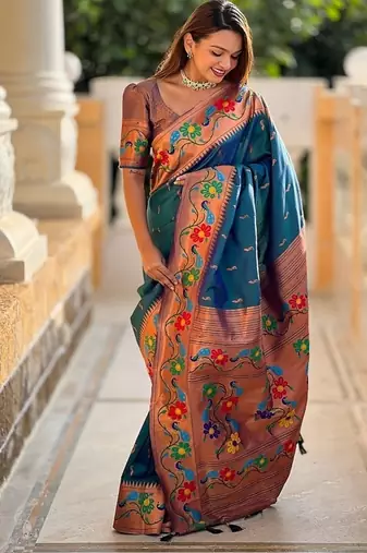 Teal silk blend saree with peacock motif zari border