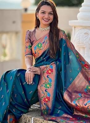 Teal silk blend saree with peacock motif zari border 4