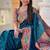Teal silk blend saree with peacock motif zari border