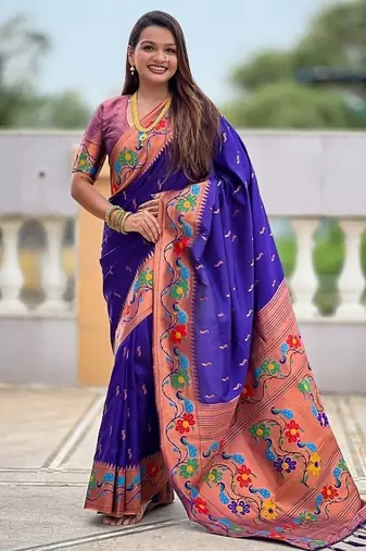 Violet silk blend saree with peacock motif zari border