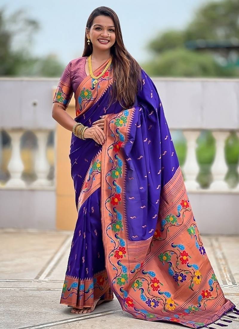 Violet silk blend saree with peacock motif zari border