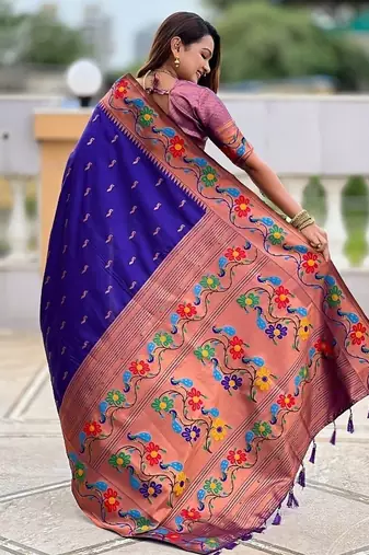 Violet silk blend saree with peacock motif zari border