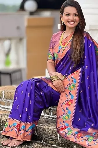 Violet silk blend saree with peacock motif zari border