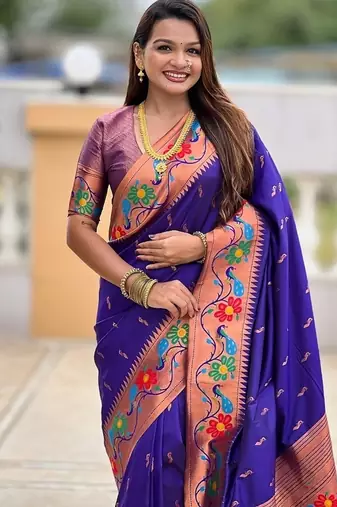 Violet silk blend saree with peacock motif zari border