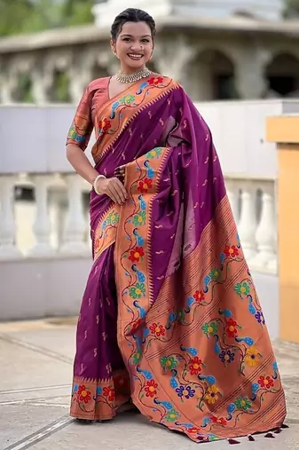Wine silk blend saree with peacock motif zari border