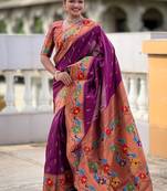 Wine silk blend saree with peacock motif zari border