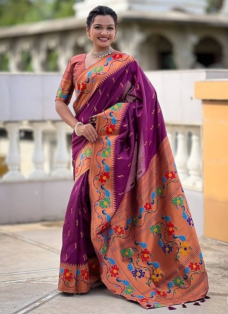 Wine silk blend saree with peacock motif zari border