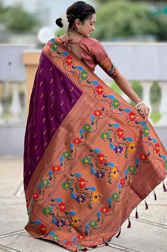 Wine silk blend saree with peacock motif zari border