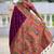Wine silk blend saree with peacock motif zari border
