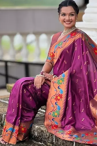 Wine silk blend saree with peacock motif zari border