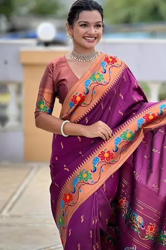 Wine silk blend saree with peacock motif zari border