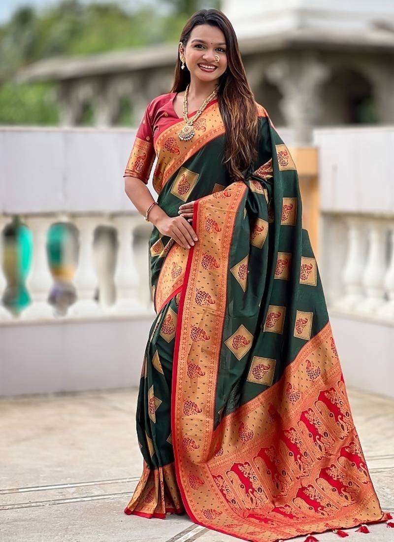 Festive green banarasi silk blend saree with colorful meenakari border