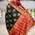 Festive green banarasi silk blend saree with colorful meenakari border