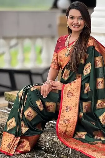 Festive green banarasi silk blend saree with colorful meenakari border