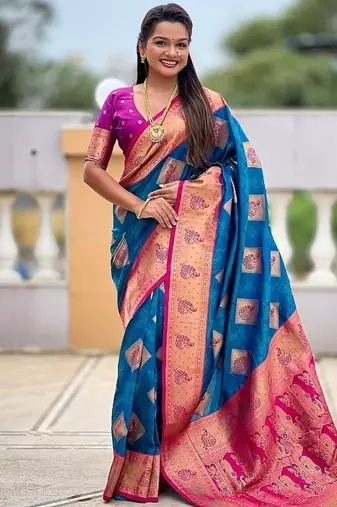 Festive firozi banarasi silk blend saree with colorful meenakari border