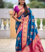 Festive firozi banarasi silk blend saree with colorful meenakari border