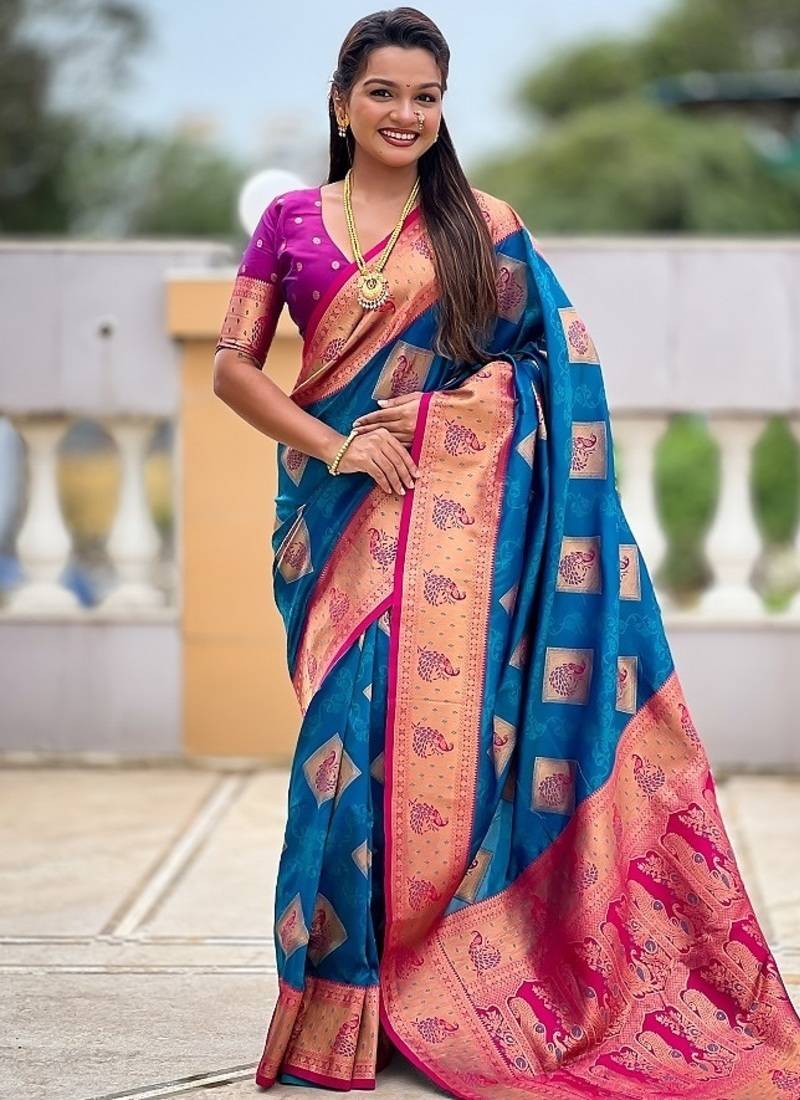 Festive firozi banarasi silk blend saree with colorful meenakari border