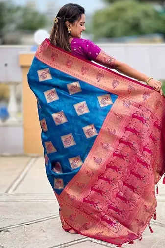 Festive firozi banarasi silk blend saree with colorful meenakari border
