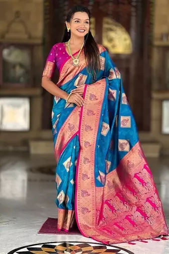 Festive firozi banarasi silk blend saree with colorful meenakari border