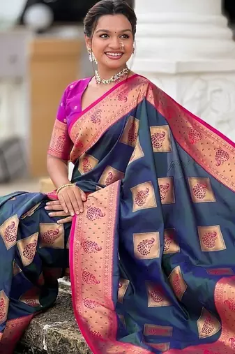Festive teal banarasi silk blend saree with colorful meenakari border