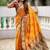 Festive mustard banarasi silk blend saree with colorful meenakari border