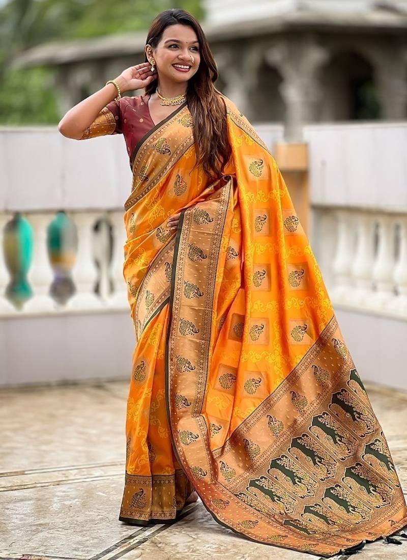 Festive mustard banarasi silk blend saree with colorful meenakari border