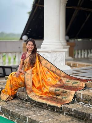 Festive mustard banarasi silk blend saree with colorful meenakari border 5