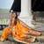 Festive mustard banarasi silk blend saree with colorful meenakari border
