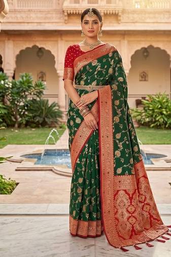 Festive darkgreen banarasi silk blend saree with colorful meenakari border