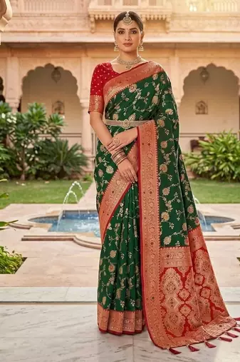 Festive darkgreen banarasi silk blend saree with colorful meenakari border