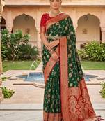Festive darkgreen banarasi silk blend saree with colorful meenakari border