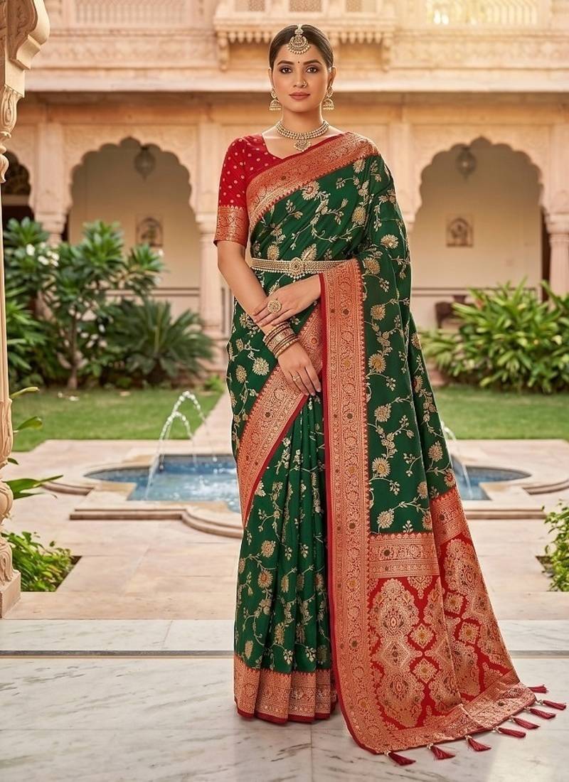 Festive darkgreen banarasi silk blend saree with colorful meenakari border