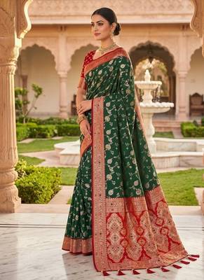 Festive darkgreen banarasi silk blend saree with colorful meenakari border 3
