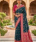 Festive teal banarasi silk blend saree with colorful meenakari border
