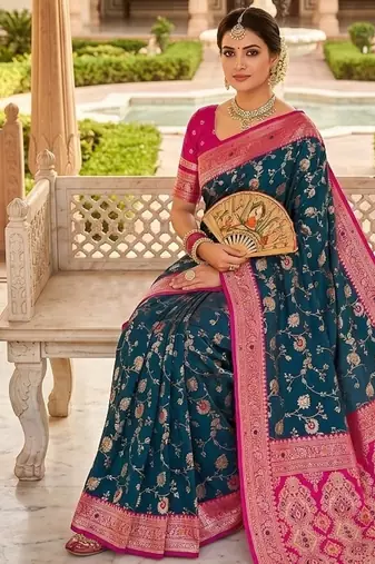 Festive teal banarasi silk blend saree with colorful meenakari border