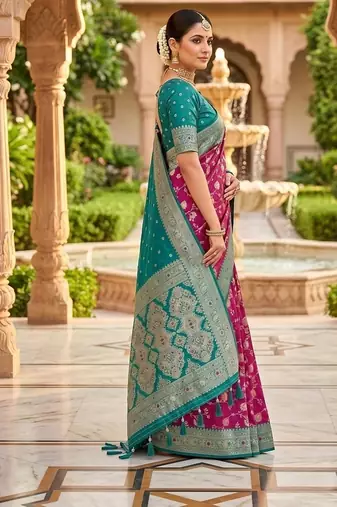 Festive onion banarasi silk blend saree with colorful meenakari border