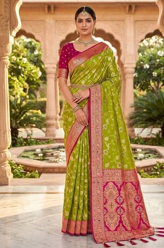 Festive perrot banarasi silk blend saree with colorful meenakari border