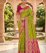 Festive perrot banarasi silk blend saree with colorful meenakari border