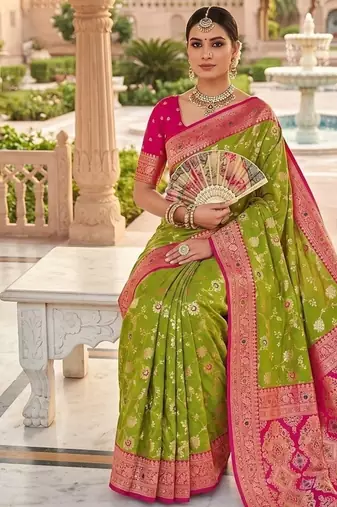 Festive perrot banarasi silk blend saree with colorful meenakari border