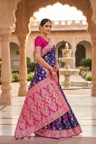 Festive purple banarasi silk blend saree with colorful meenakari border