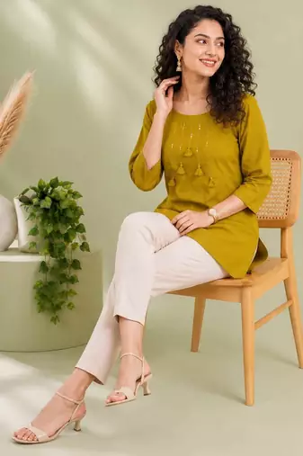 Mustard yellow cotton short kurti for women with tassel detail