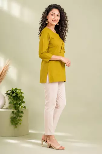 Mustard yellow cotton short kurti for women with tassel detail