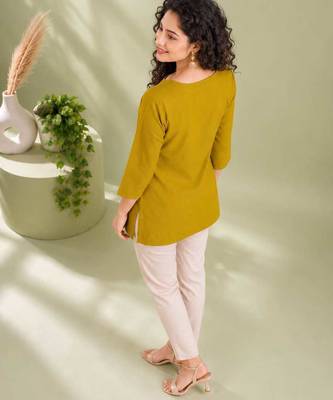 Mustard yellow cotton short kurti for women with tassel detail 5