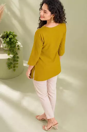 Mustard yellow cotton short kurti for women with tassel detail
