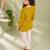 Mustard yellow cotton short kurti for women with tassel detail