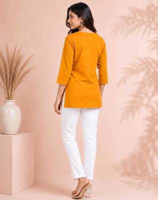 mustard cotton embroidered short kurti 3